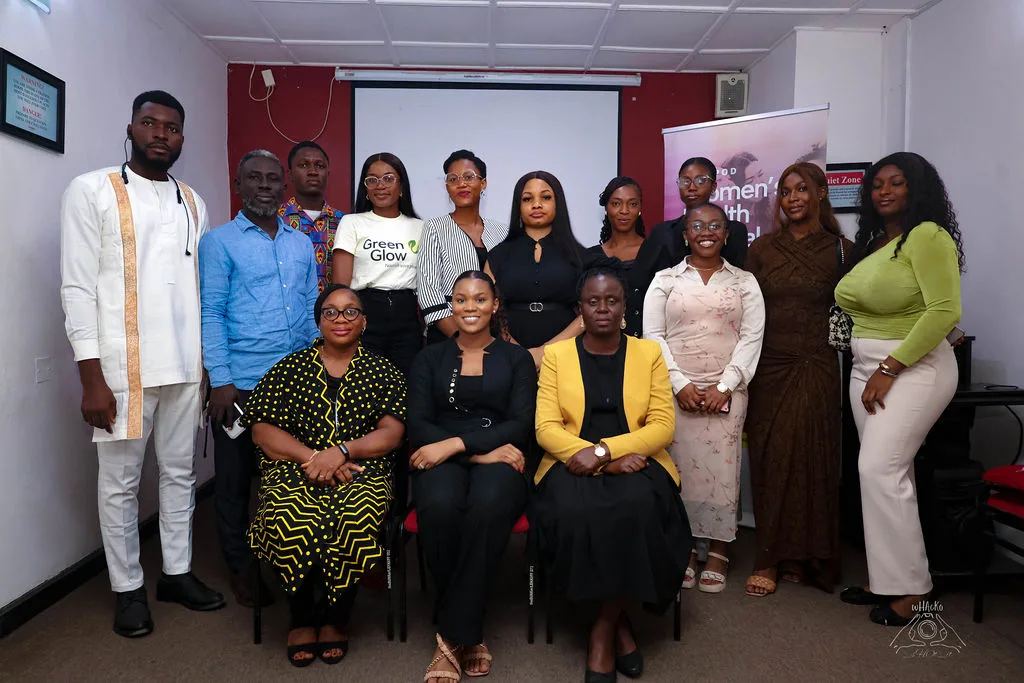 Fifteen attendees and organisers gathered for a group portrait