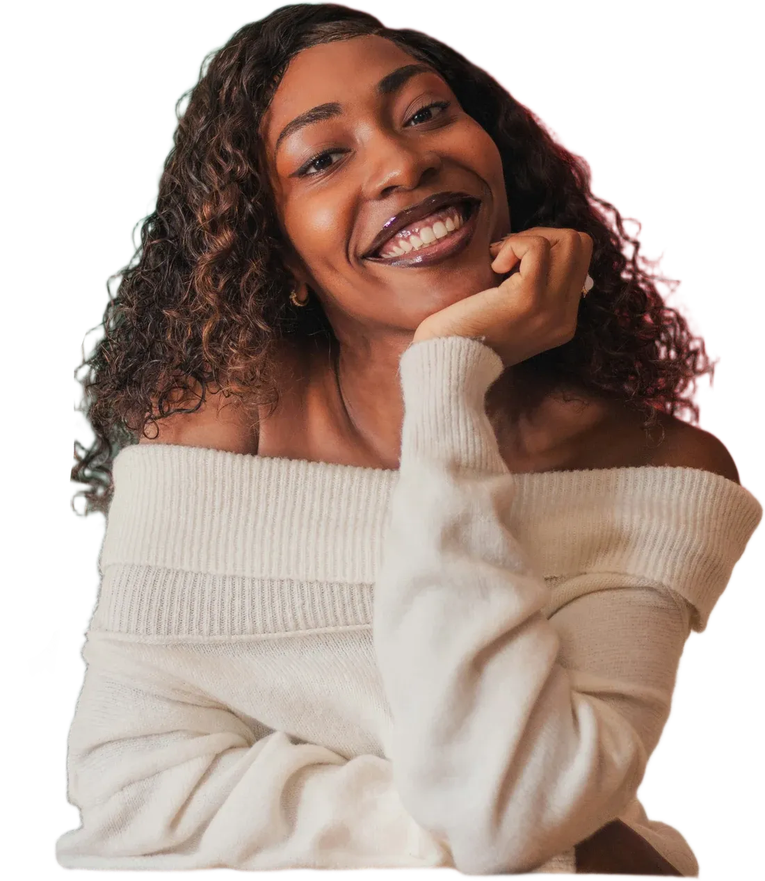 A woman smiling, cut out against the page